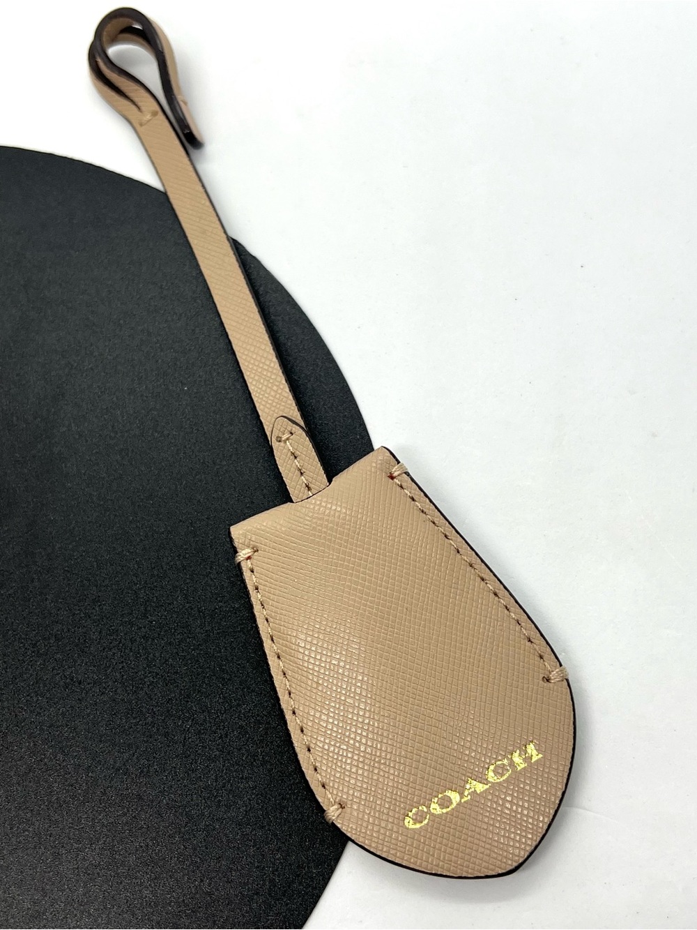 COACH Crossgrain Leather Clochette Hidden Key Ring Bag Charm Beige